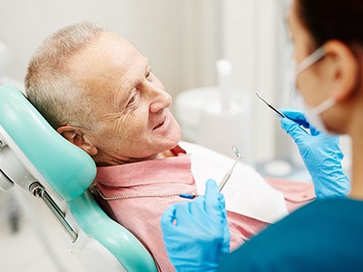 Male patient preparing for a dental checkup