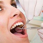 Closeup of a person receiving a dental exam