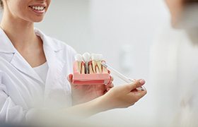 A patient at a full mouth rehabilitation consultation