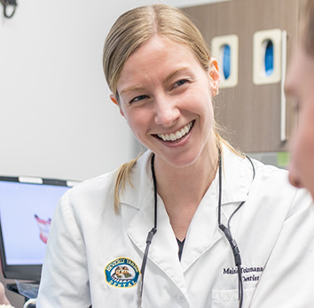 Dentist With Patient