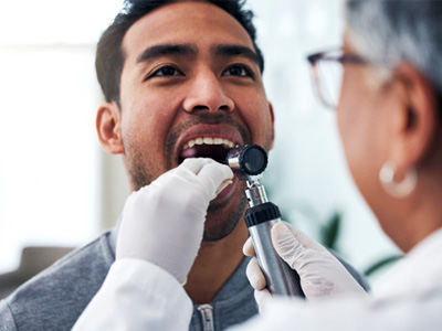Your dentist will look for abnormalities in your mouth during your oral cancer screening
