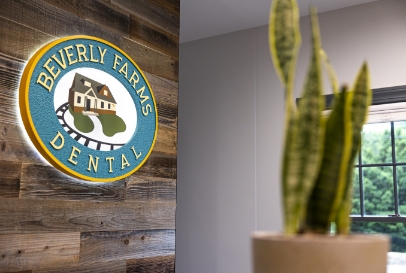 Dental logo on wall inside waiting room
