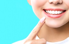 smiling woman teeth whitening in Beverly