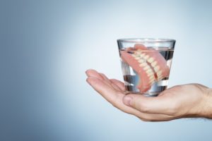 dentures in water glass