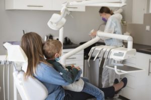 family at child's dental checkup during the COVID-19 pandemic