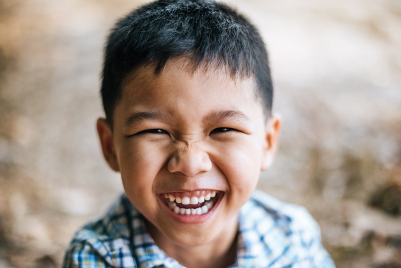 closeup of little boy smiling