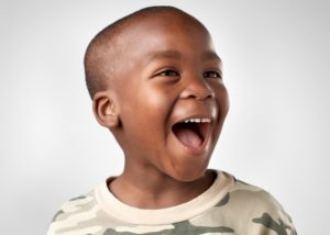 Smiling young boy with great oral health