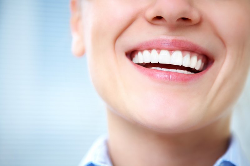 a person smiling with beautiful teeth in Beverly